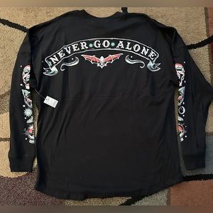 NWT Halloween Horror Nights Spirit Jersey “Never Go Alone” 2023